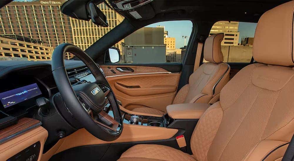 A close up of the side view of the driver's seat of a 2025 Jeep Grand Cherokee L.