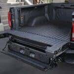 The bed and tailgate is shown on a black 2024 GMC Sierra 1500 Denali.