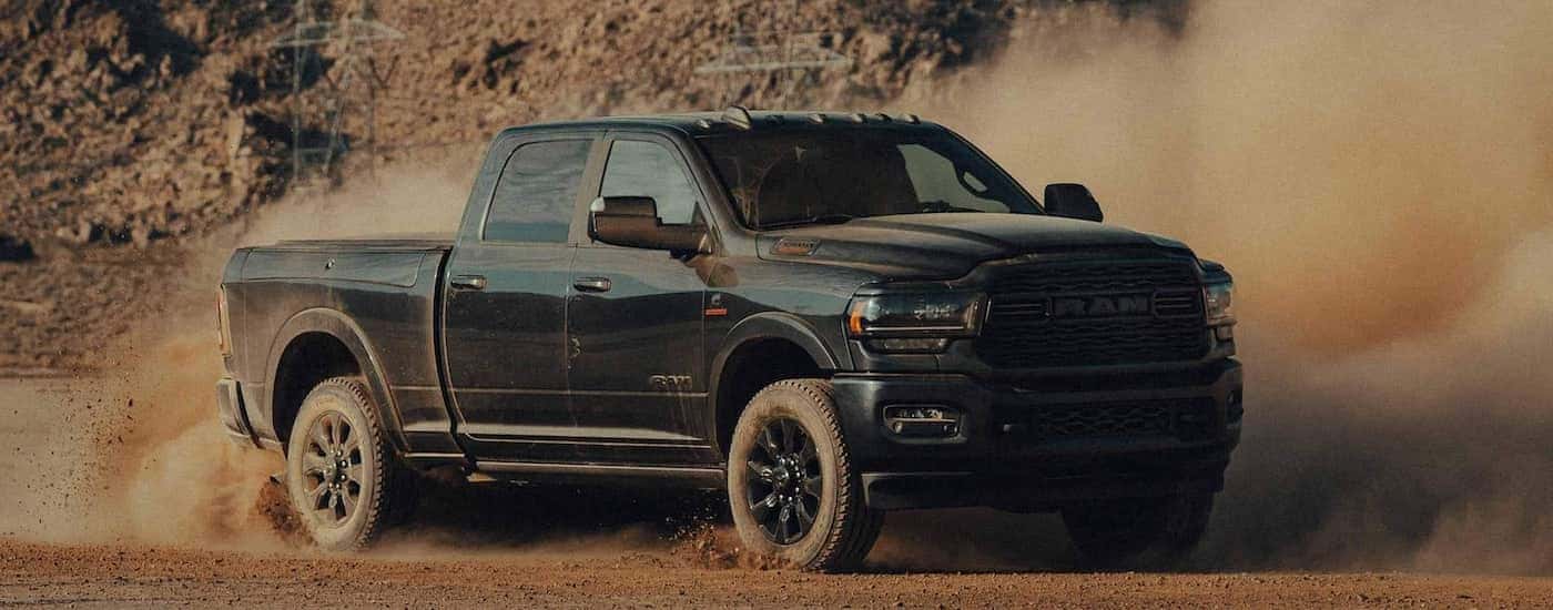 A black 2022 Ram 2500 is shown form the side.