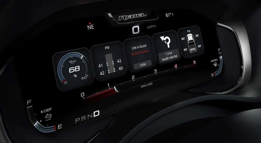 The digital dash display is shown in a 2023 Ram 2500 Rebel.
