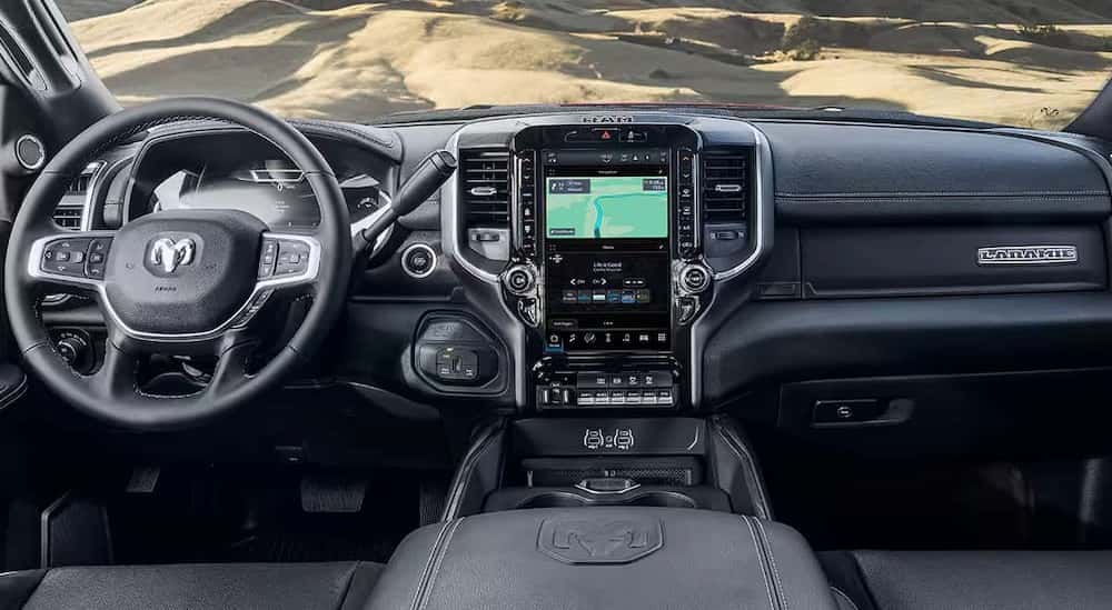 The gray dashboard is shown in a 2025 Ram 2500 Laramie.