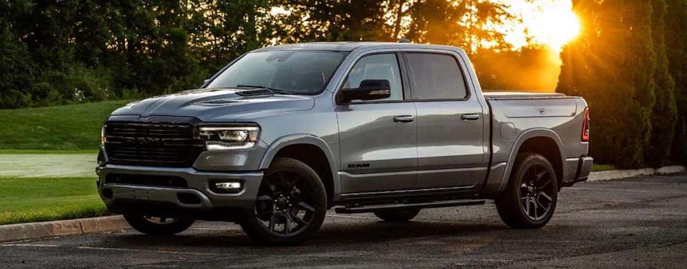 A silver 2022 Ram 1500 is shown from the side.