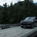 A grey 2025 Jeep Grand Cherokee L from the front at an angle.