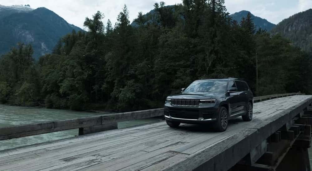 A grey 2025 Jeep Grand Cherokee L from the front at an angle.