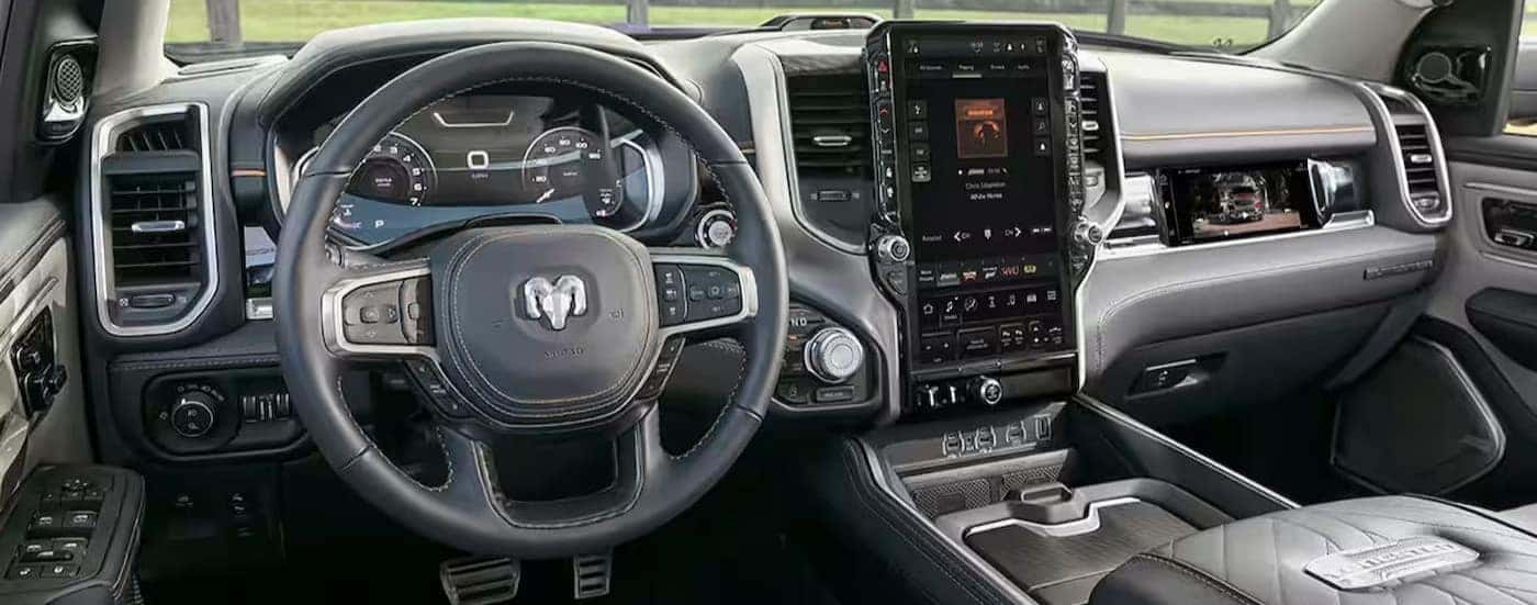 The gray dash in a 2025 Ram 1500 for sale near Covington.