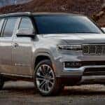 A grey 2025 Jeep Grand Wagoneer from the front at an angle.