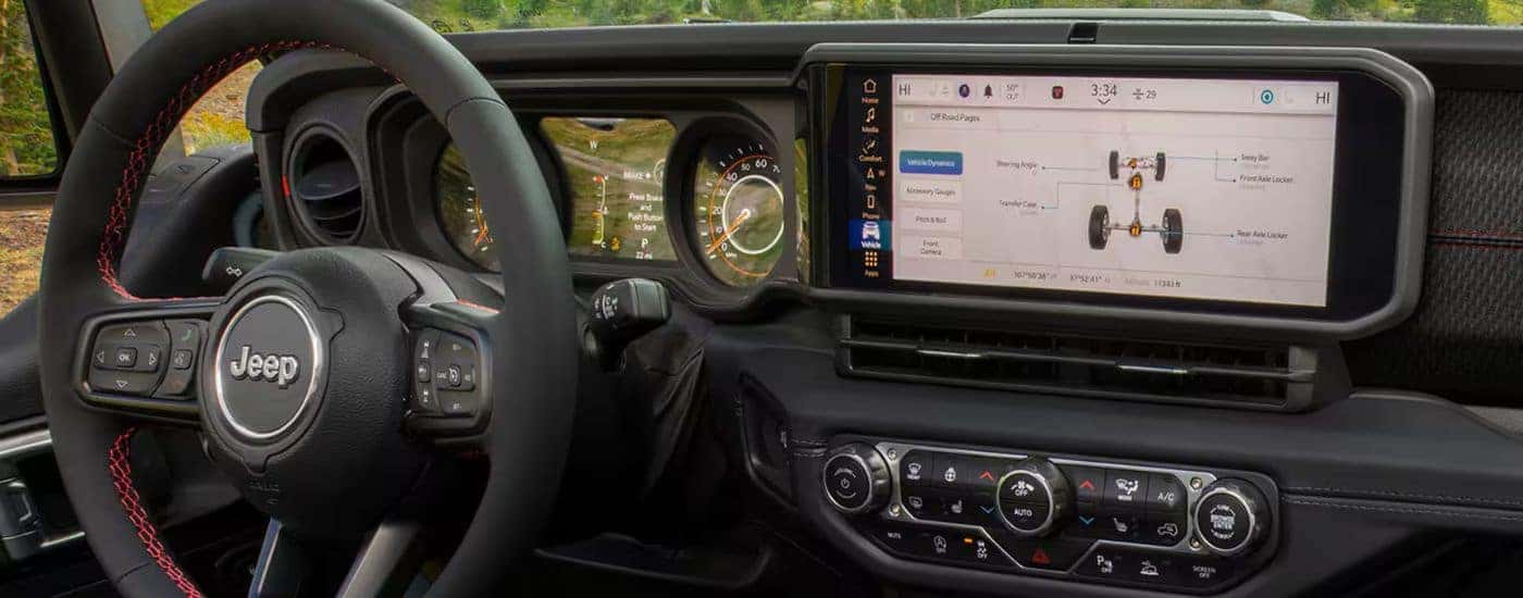 The black dash in a 2025 Jeep Gladiator for sale near Fairfield.