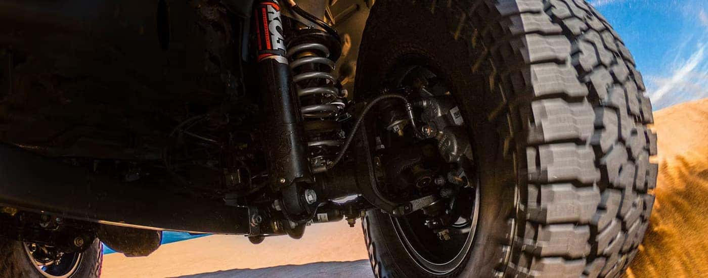 Suspension and tire on a 2025 Jeep Gladiator