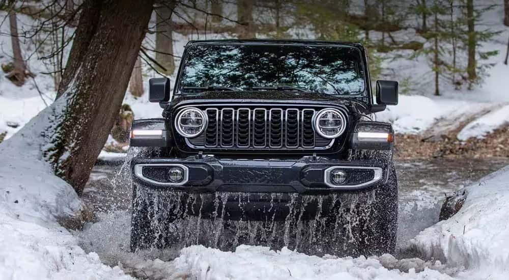 Black 2025 Jeep Wrangler off-roading