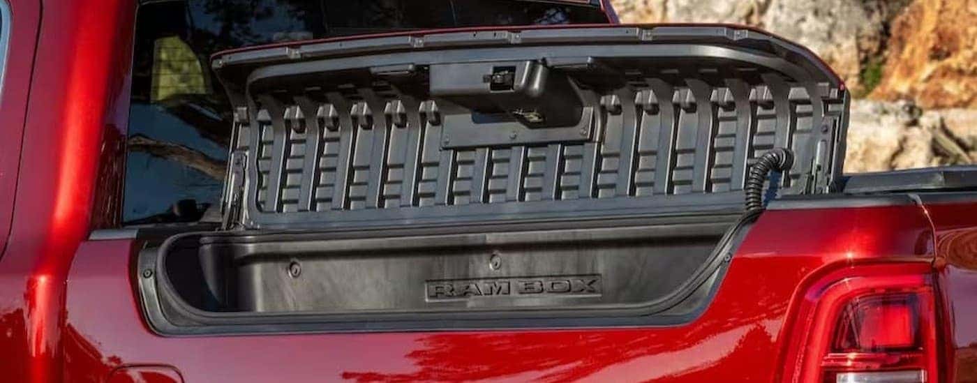 An open Ram Box on a red 2026 Ram 1500.