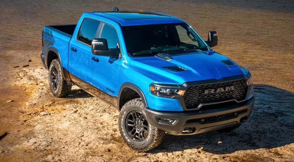 Blue 2026 Ram 1500 for sale near Alexandria parked off-road