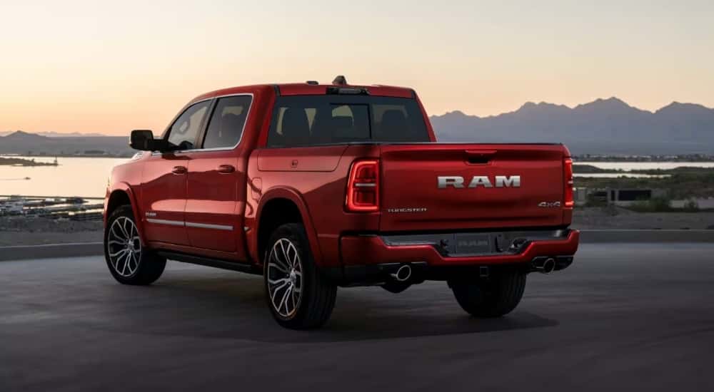 Red 2026 Ram 1500 Tungsten parked near a marsh