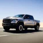 Silver 2026 Ram 1500 RHO driving to a Ram dealer near Cincinnati