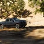 Black 2026 Ram 2500 driving to a Ram dealer near Norwood