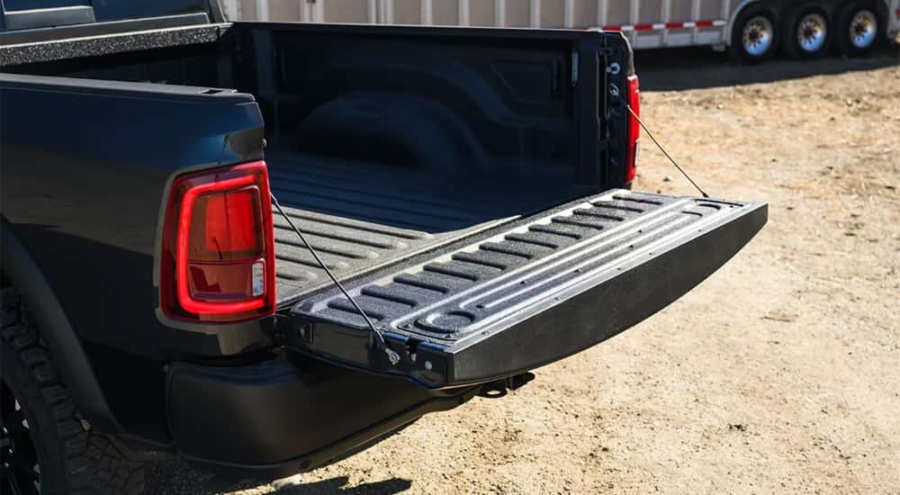 Open tailgate on a black 2026 Ram 2500
