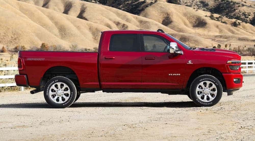A red 2026 Ram 2500 parked offroad.