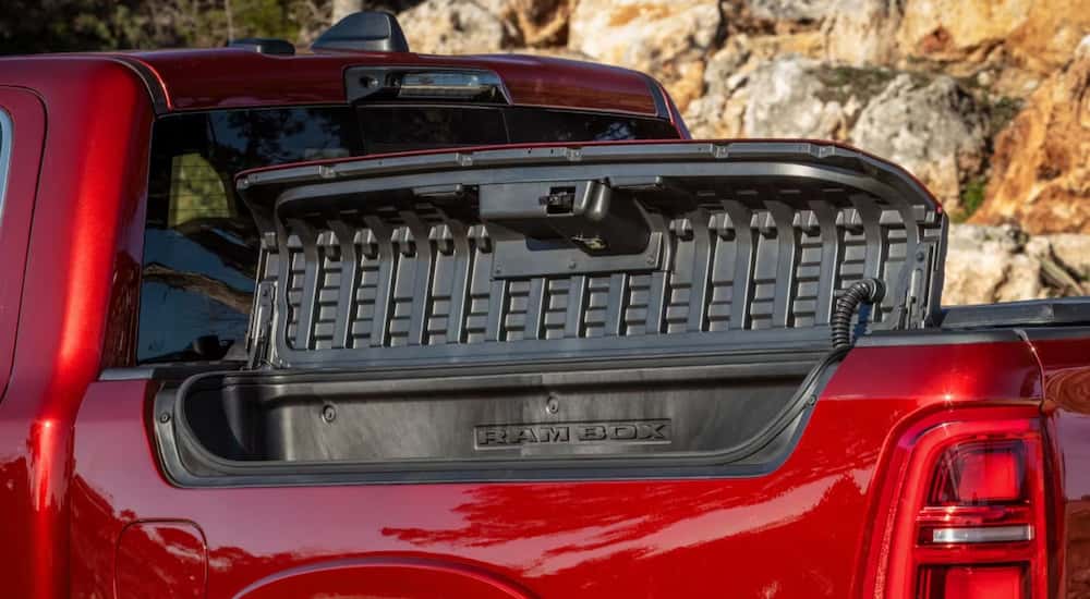 Open Ram Box on a red 2026 Ram 1500
