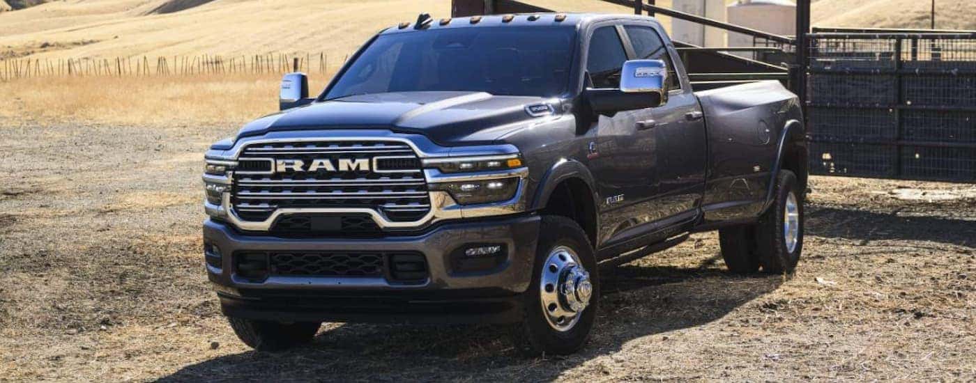 Black 2025 Ram 3500 parked off-road.
