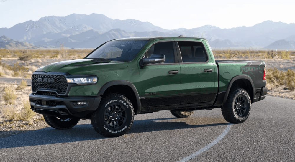 Green 2026 Ram 1500 Rebel parked at an angle