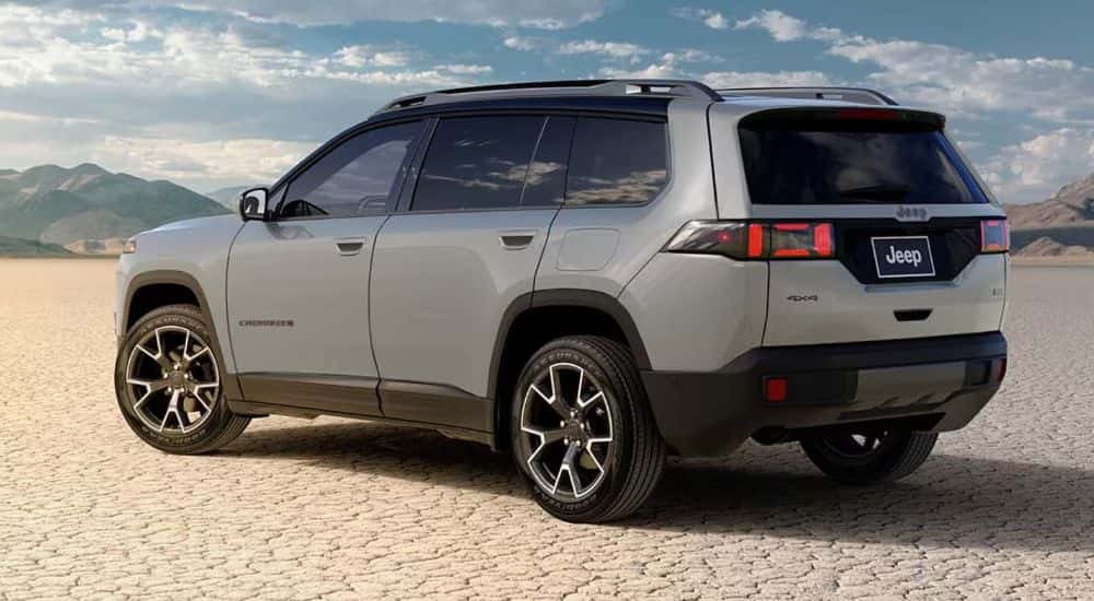 Grey 2026 Jeep Cherokee Overland parked in a desert
