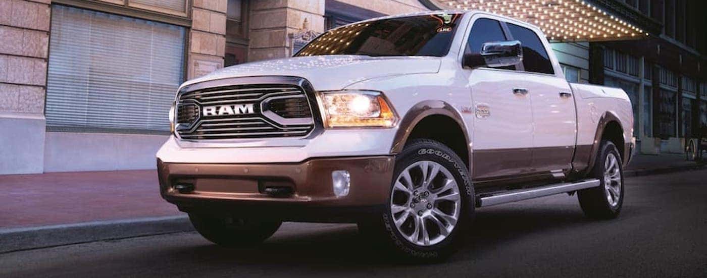 White 2018 Ram 1500 driving on the road
