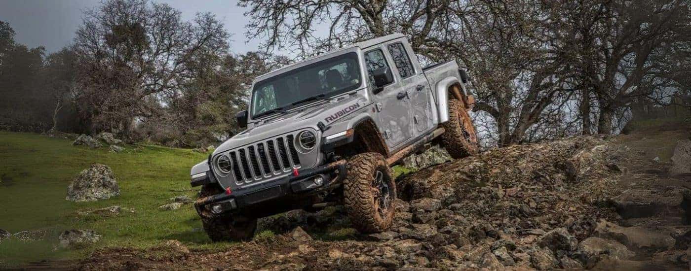 Grey 2022 Jeep Gladiator Rubicon rock crawling