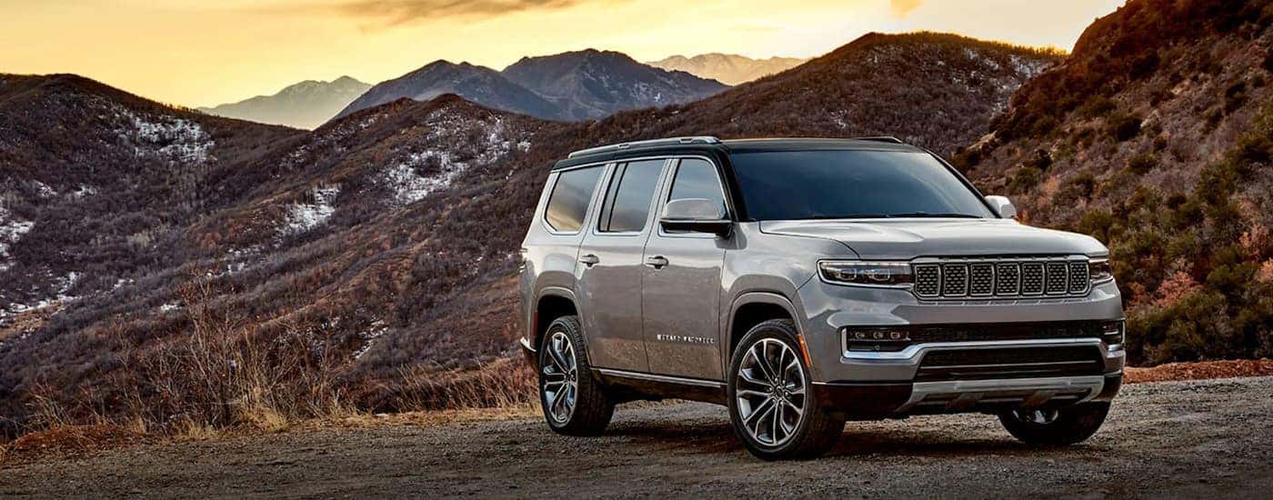 Grey 2023 Jeep Wagoneer L parked in the mountains