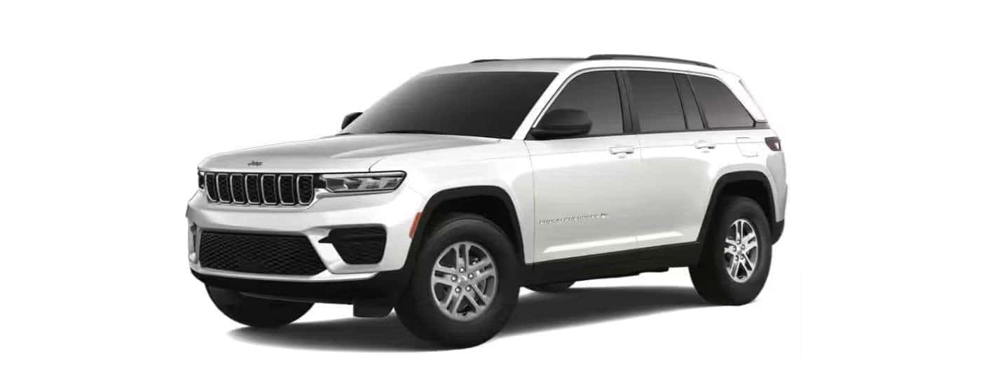 White 2025 Jeep Grand Cherokee angled left.