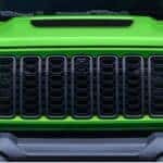 Green 2026 Jeep Wrangler grill close up.
