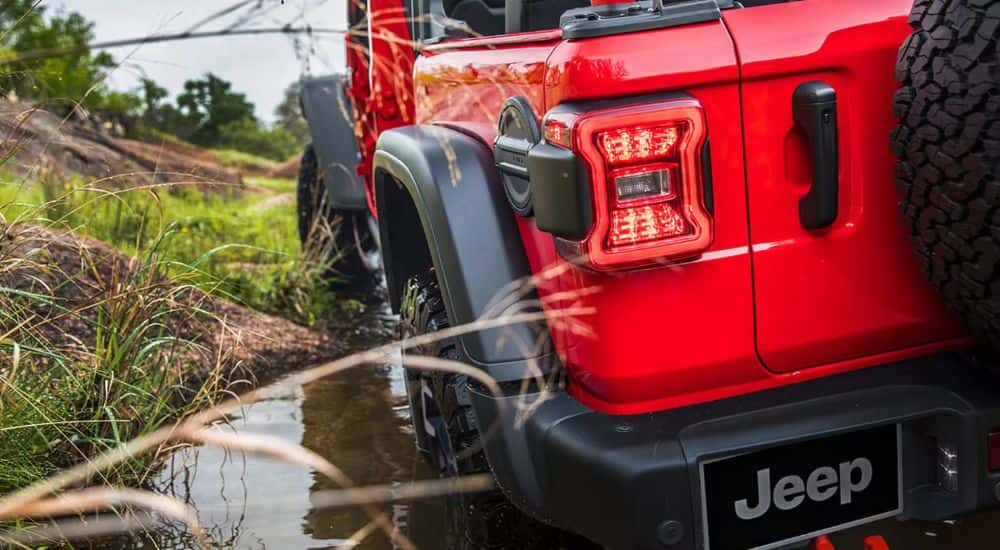 Red 2026 Jeep Wrangler from the rear close up.