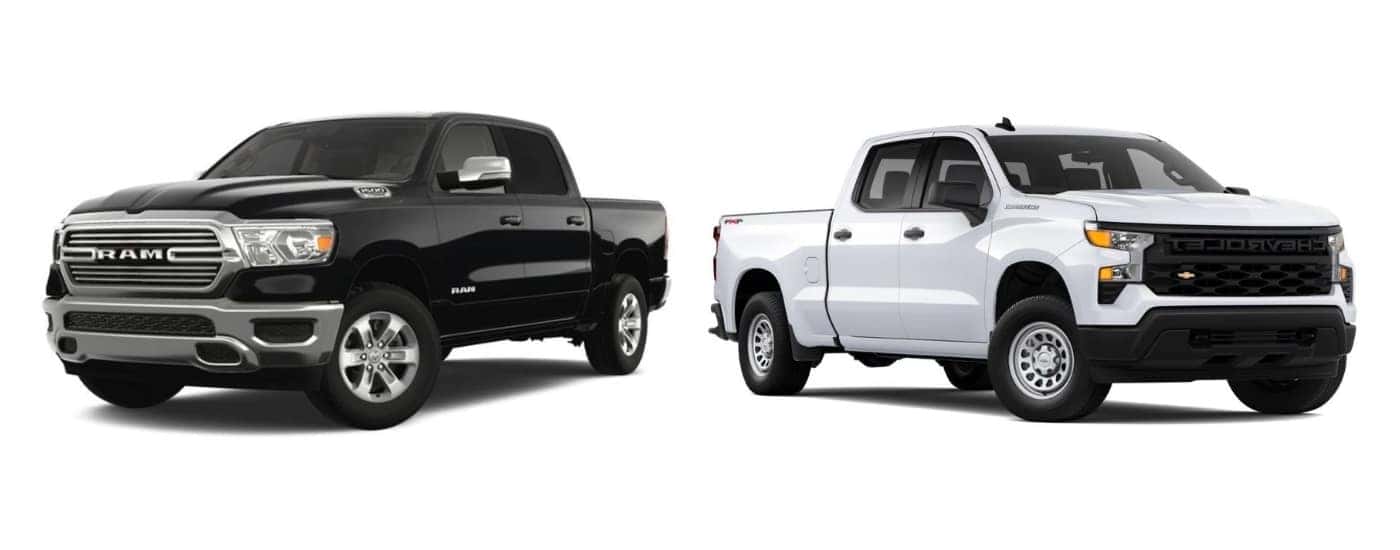 Black 2022 Ram 1500 angled left and white 2022 Chevy Silverado 1500 angled right