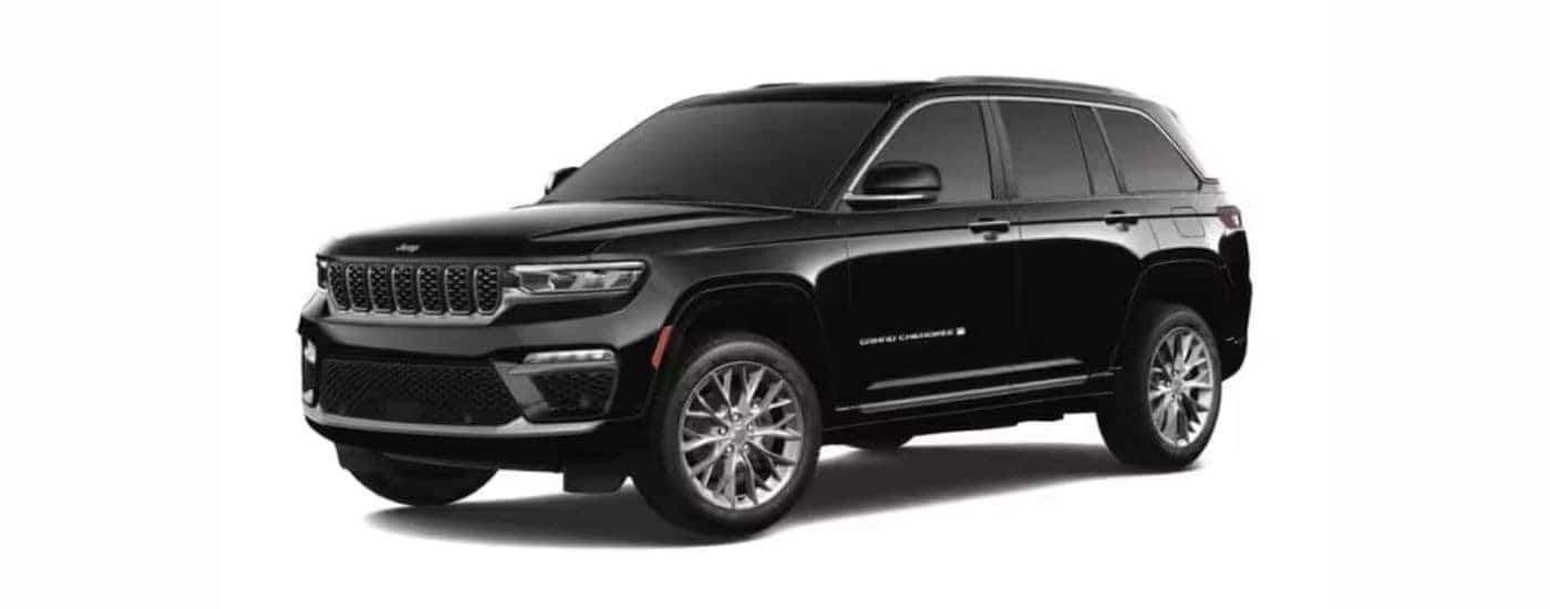 A black 2022 Jeep Grand Cherokee with a white background angled left.