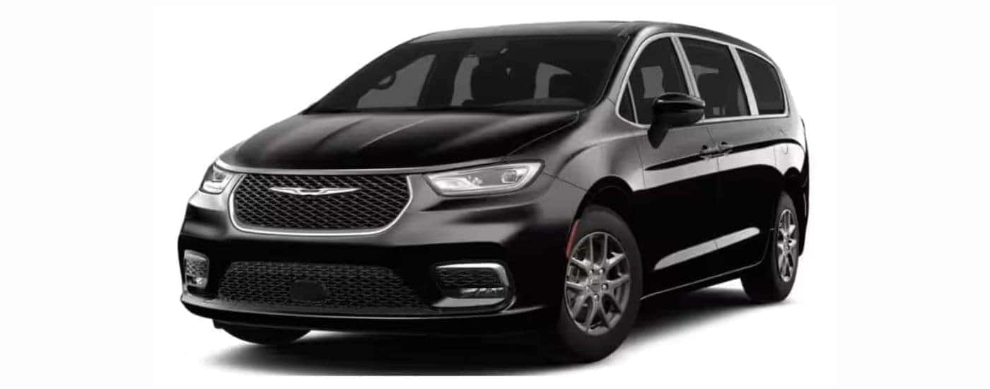 A black 2023 Chrysler Pacifica with a white background.