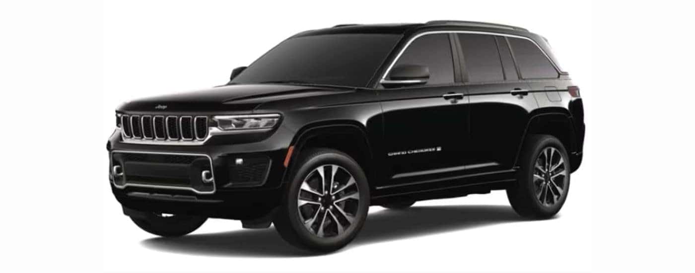 A black 2023 Jeep Grand Cherokee with a white background.
