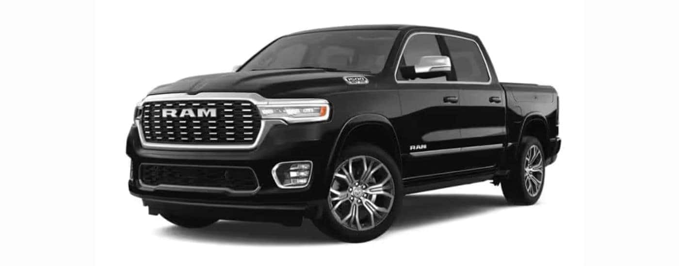 A black 2025 Ram 1500 with a white background.