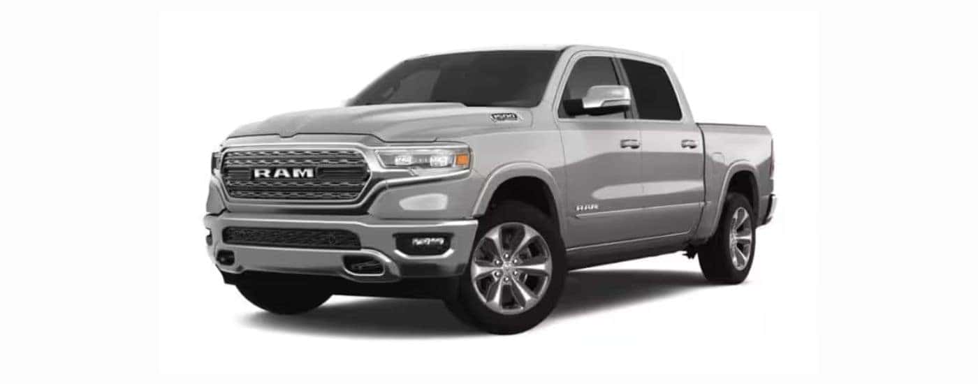 A gray 2023 Ram 1500 with a white background.