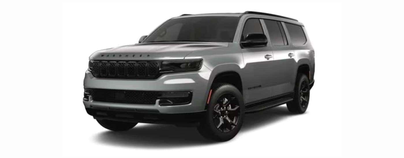 A gray 2023 Wagoneer L with a white background.