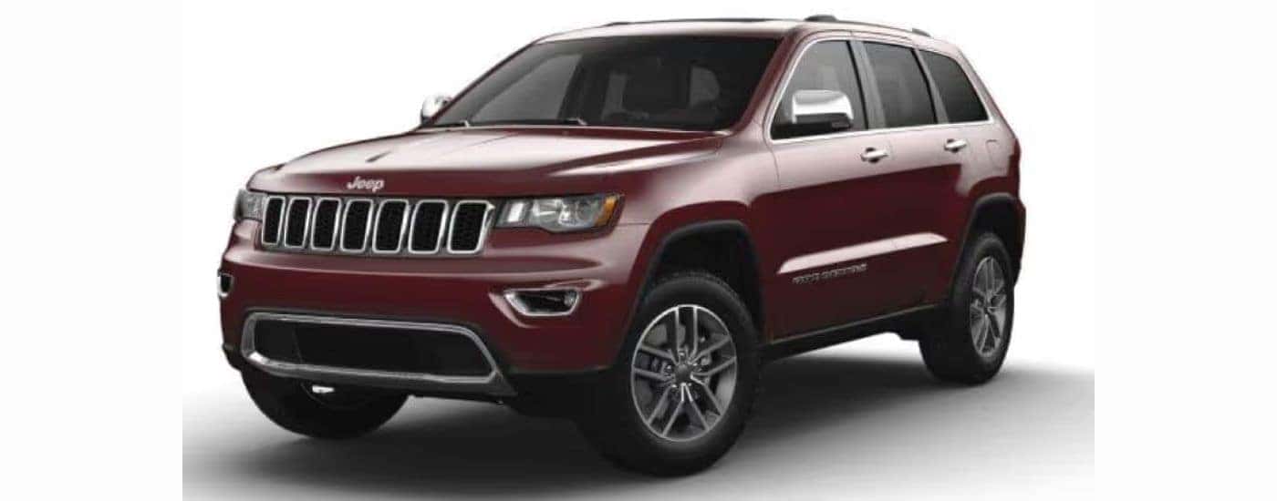 A red 2022 Jeep Grand Cherokee WK with a white background angled left.