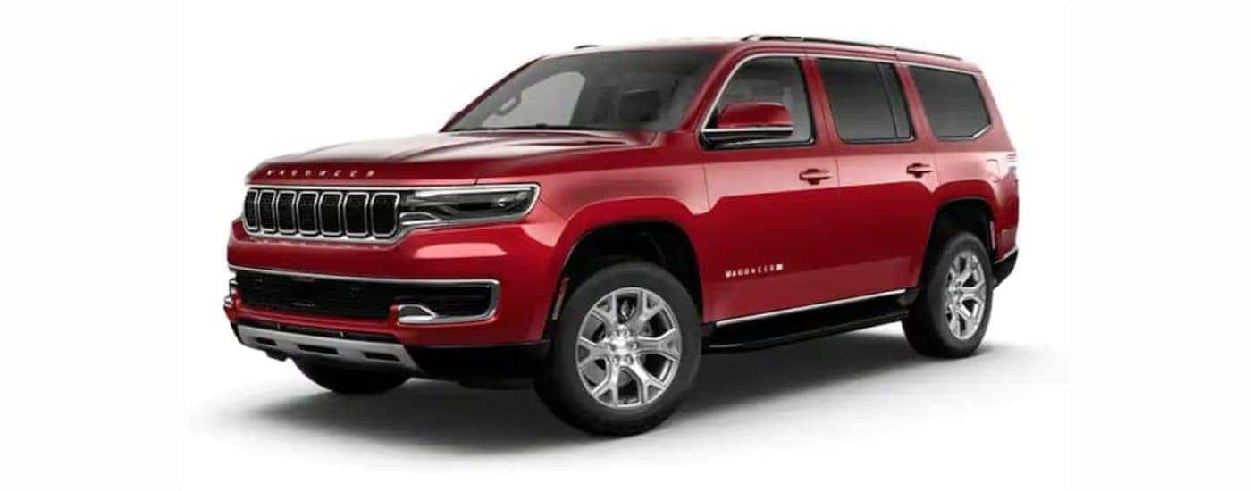 A red 2022 Wagoneer with a white background.