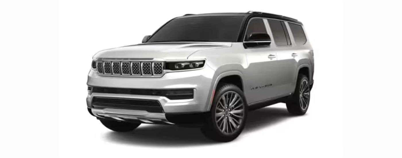 A silver 2022 Jeep Grand Wagoneer with a white background angled left.
