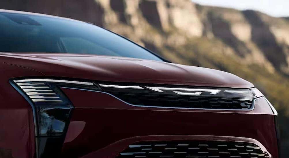 Red frontend of a 2027 Chrysler Pacifica.
