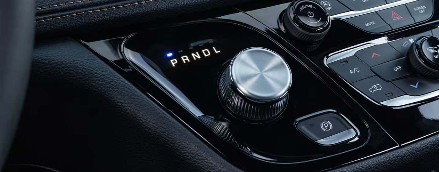 Close-up of the gear shift knob in a 2027 Chrysler Pacifica.